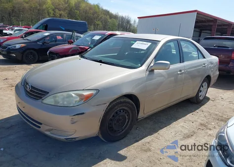 2003 Toyota Camry Le z USA, uszkodzony, nr VIN 4T1BE32K03U760397